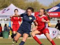 Girl-Playing-Soccer-Red-Blue